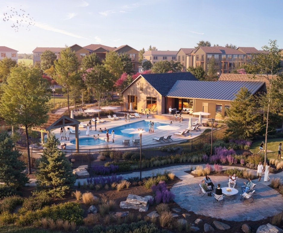 resort-style pool with seating by a building