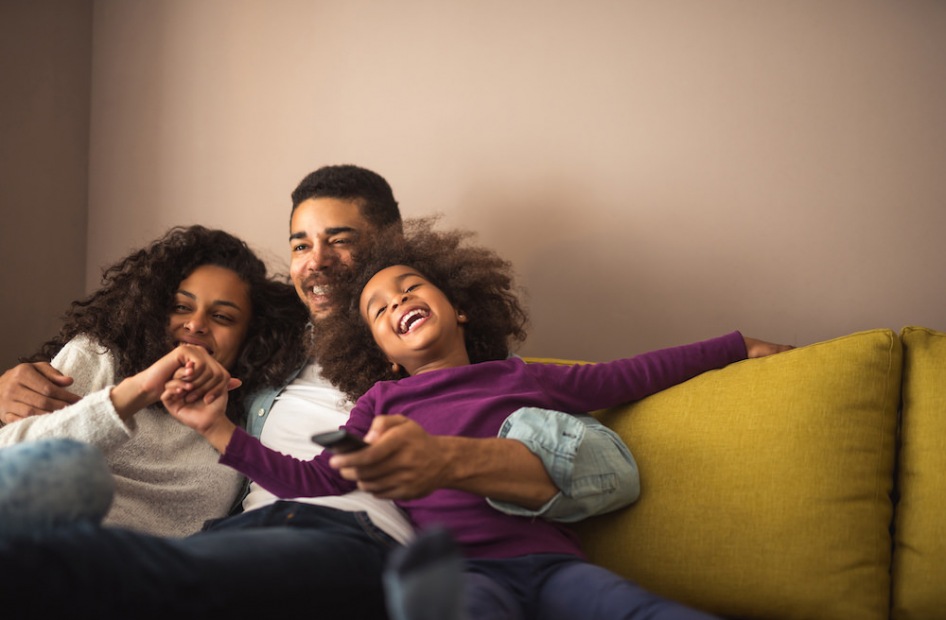 Lifestyle Family laying on the bed relaxing